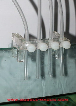 Seaside Aquatics Dosing Tube Holder, clear acrylic rim clip holding four rigid dosing pump tubes over an aquarium