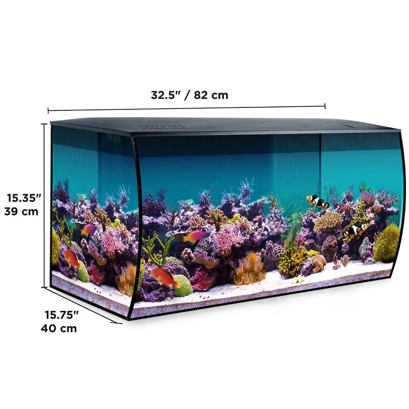 Large rectangular aquarium with coral, colorful fish, and dimensions marked in inches and cm
