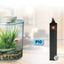 Fluval P10 nano heater shown beside a dime for scale next to a small planted desktop aquarium