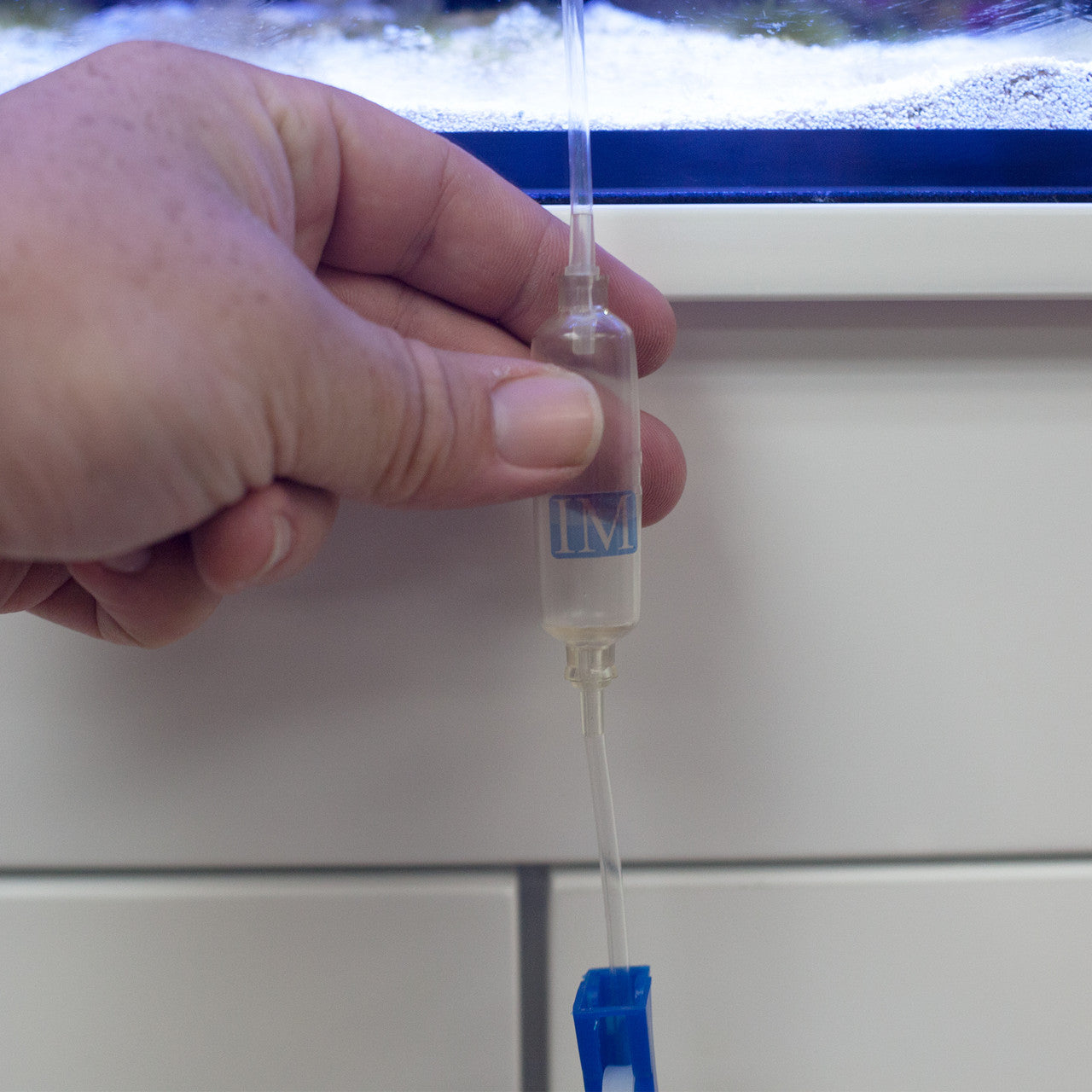 AccuDrip hang-on tube on acclimation container