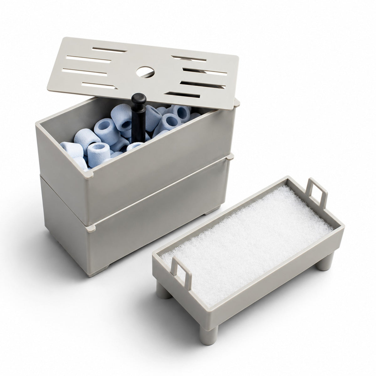 AquaFin filtration box filled with ceramic bio media, with a replaceable filter pad alongside