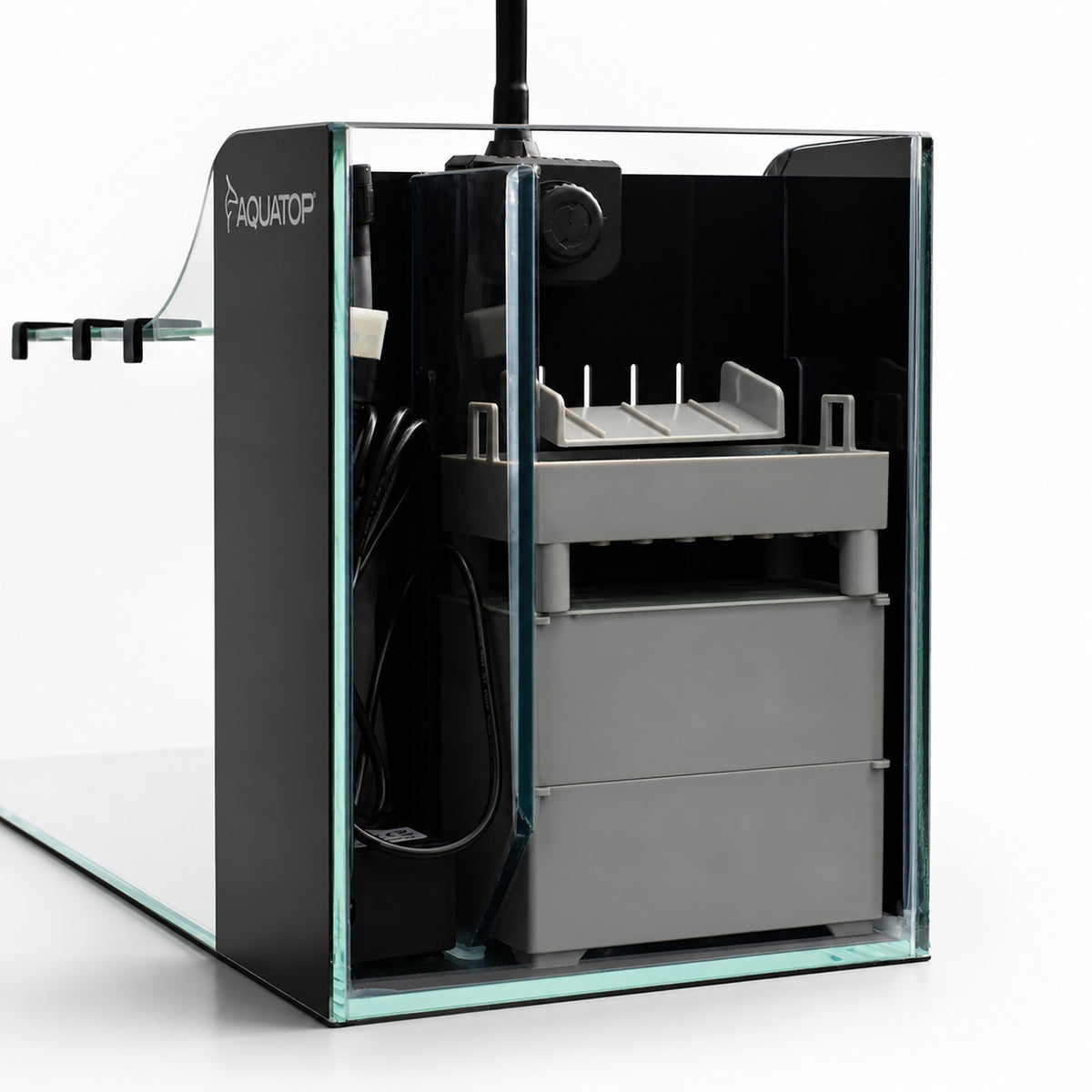 AquaFin rear chamber opened, showing the stacked filtration boxes and the submersible pump