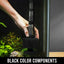 Black Easy Flow sponge filter being placed in an aquarium, showing the black components