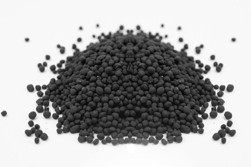 Pile of UNS Controsoil black normal granules