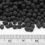 UNS Controsoil black normal granules beside a ruler showing the granule size
