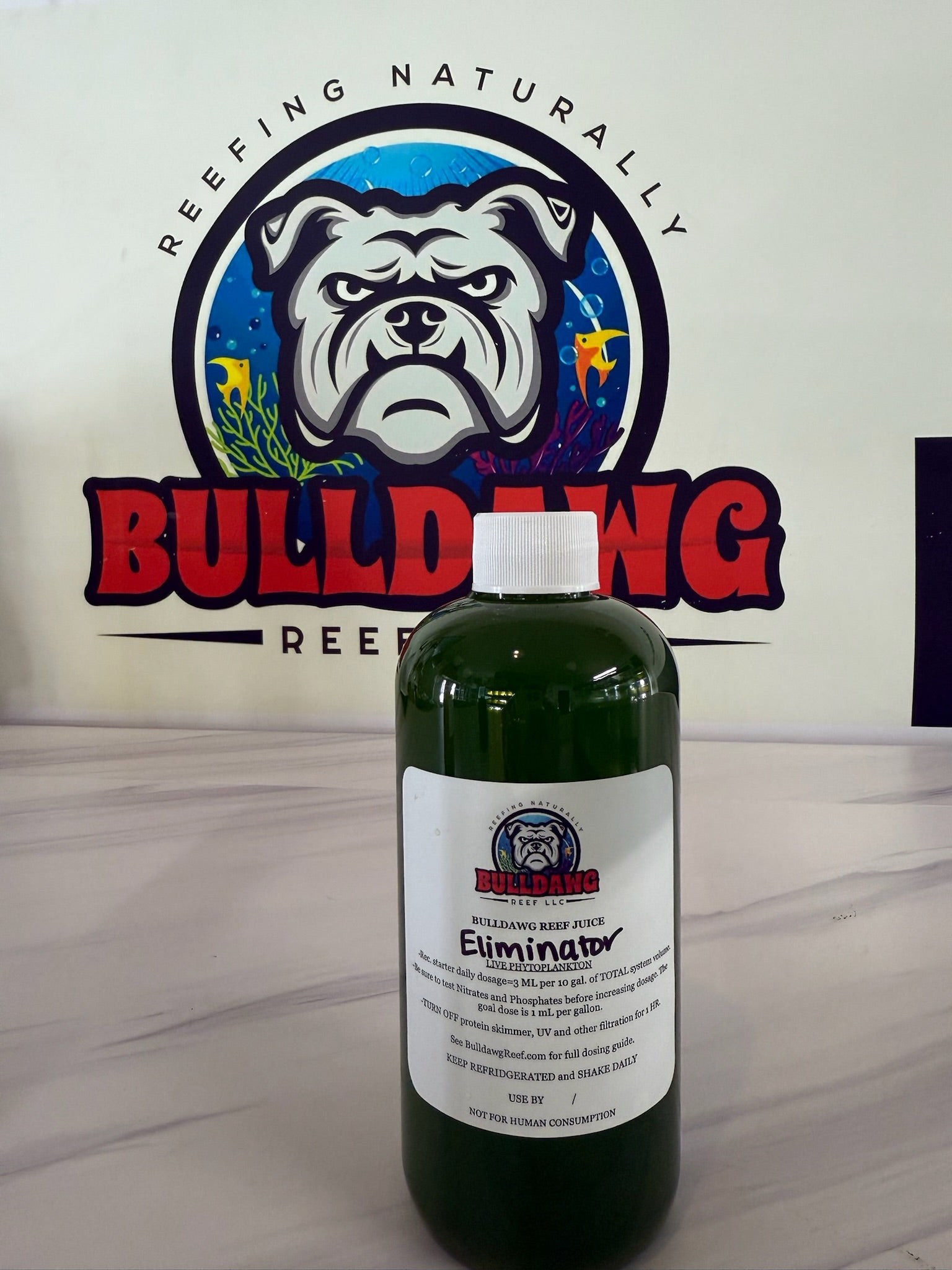 Bulldawg Reef Juice NO3 & PO4 Eliminator bottle - reef-safe nitrate and phosphate reducer for saltwater reef tanks
