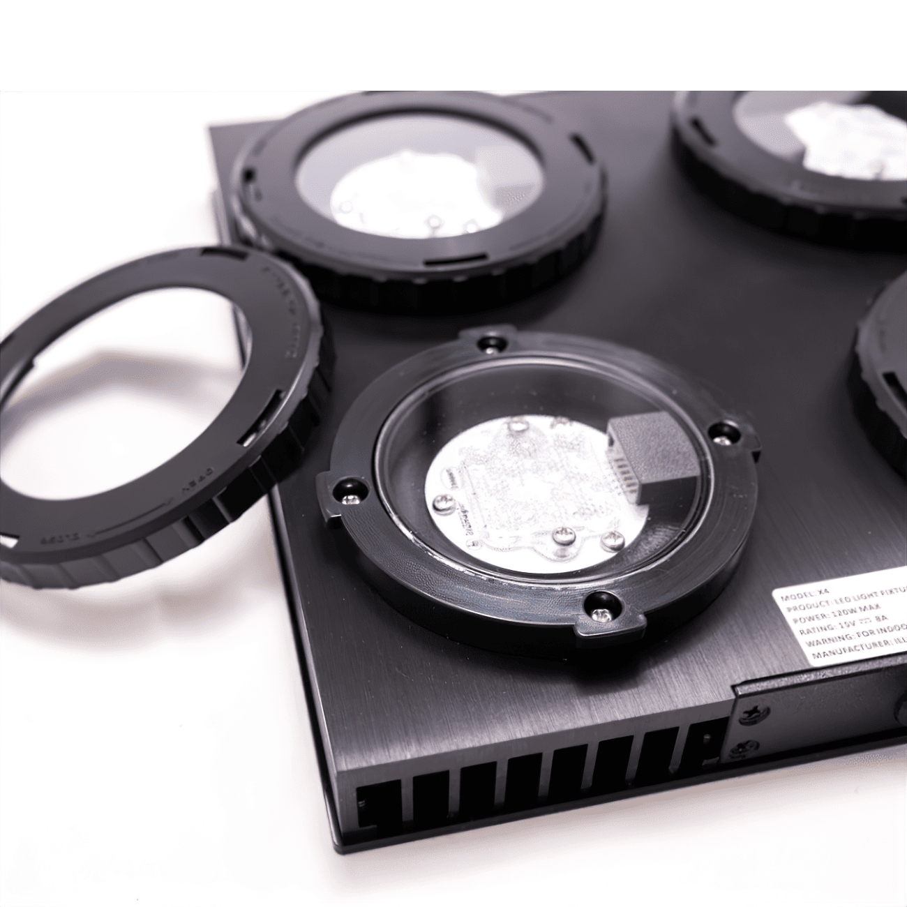 Illumagic X4 with interchangeable lens rings removed, showing the LED clusters and spec label