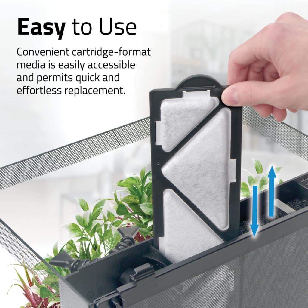 Hand inserting a Fluval Flex 2.0 Poly-Carb Cartridge into the filter for easy replacement