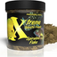 Xtreme Spirulina Flake jar with olive-green flakes poured beside it on a white background